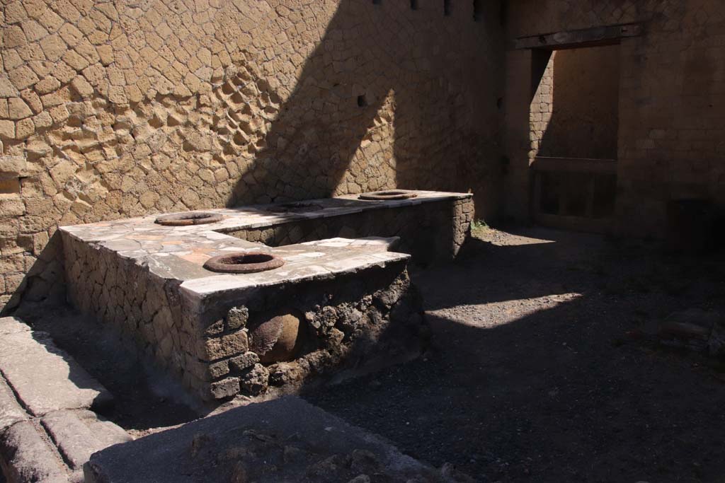 Ins. Orientalis II.6, Herculaneum. September 2019. Looking north-east across counter with imbedded dolia.
Photo courtesy of Klaus Heese.
