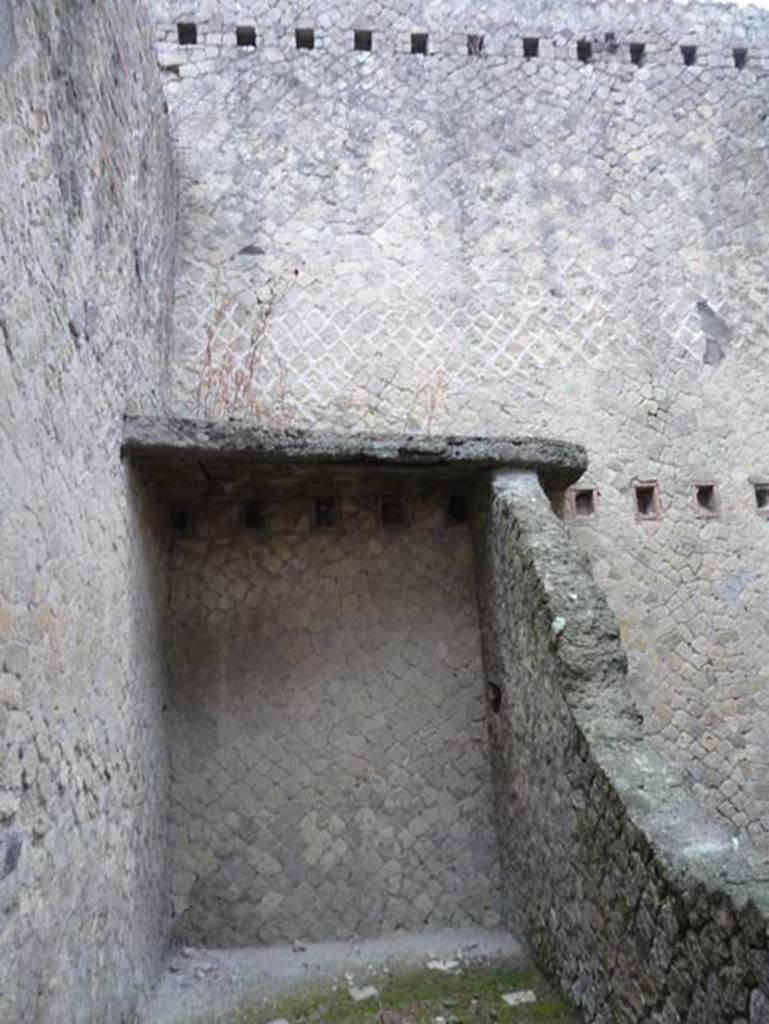 Ins. Orientalis II.6, Herculaneum. September 2015. 
Looking east across rear room, with remains of mezzanine floor, and holes for support beams for an upper floor.
