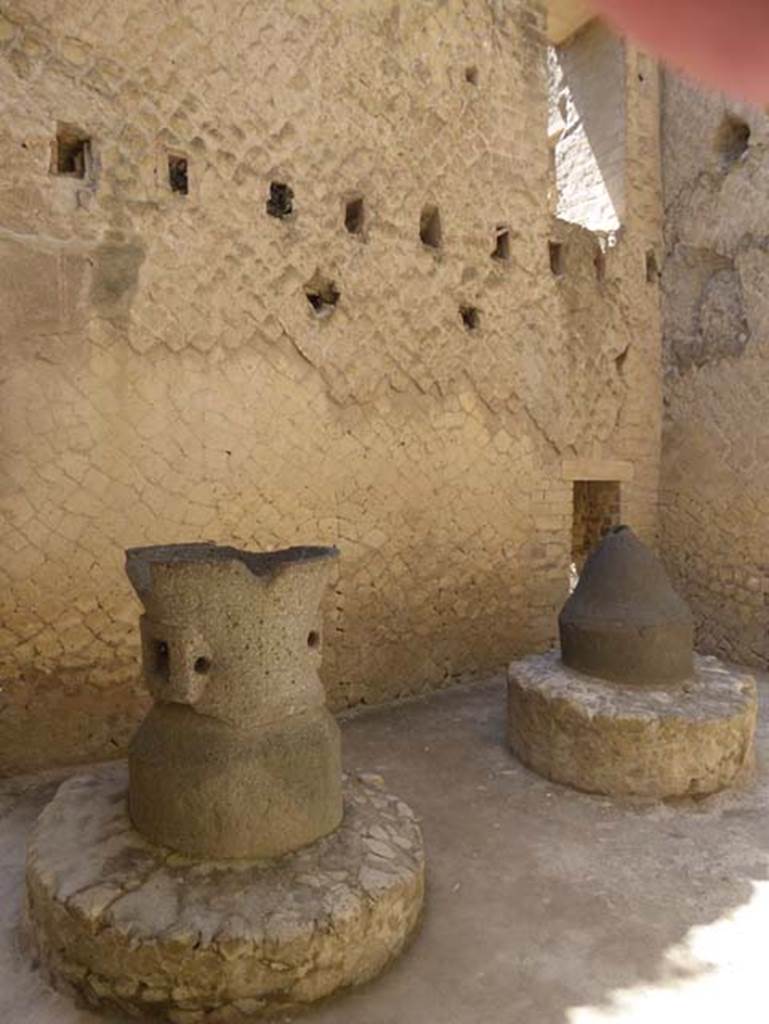 Ins. Or. II.8, Herculaneum, July 2015. Looking towards south wall and detail of mills in bakery. 
Photo courtesy of Michael Binns.
