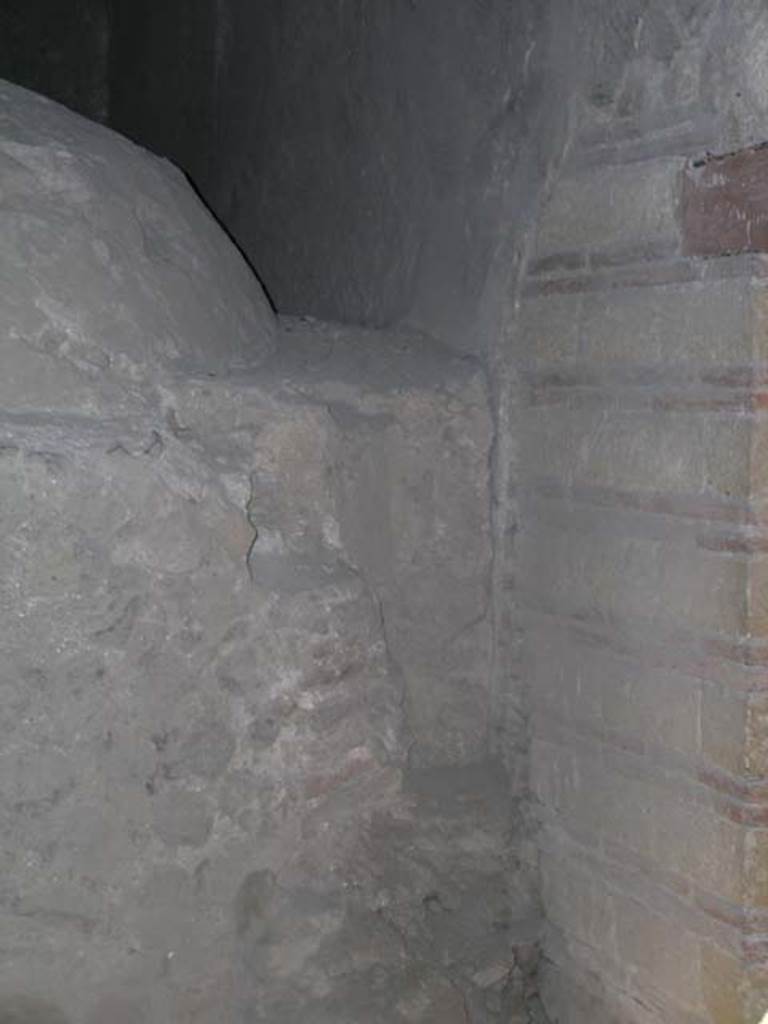 Ins. Or. II.8, Herculaneum. May 2006. 
Detail from south side of exterior of oven in bakery. Photo courtesy of Nicolas Monteix.

