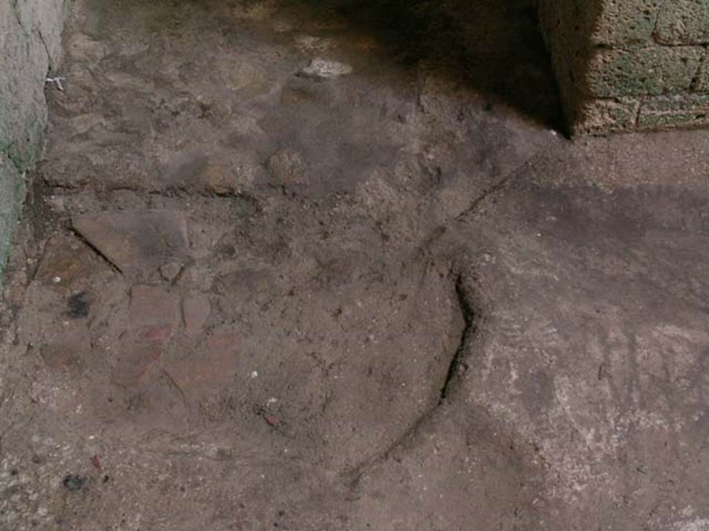 Ins Or II, 8, Herculaneum. December 2004. Room on the north side of room with oven, floor level near south wall. 
Photo courtesy of Nicolas Monteix.
