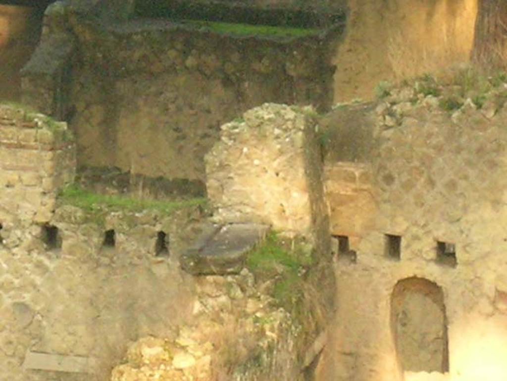 Ins. Or. II.8, Herculaneum, December 2004. Upper floor, looking towards west wall in south-west corner, on right.
On the left is the west wall of Ins.Or.II.7.  Photo courtesy of Nicolas Monteix.
