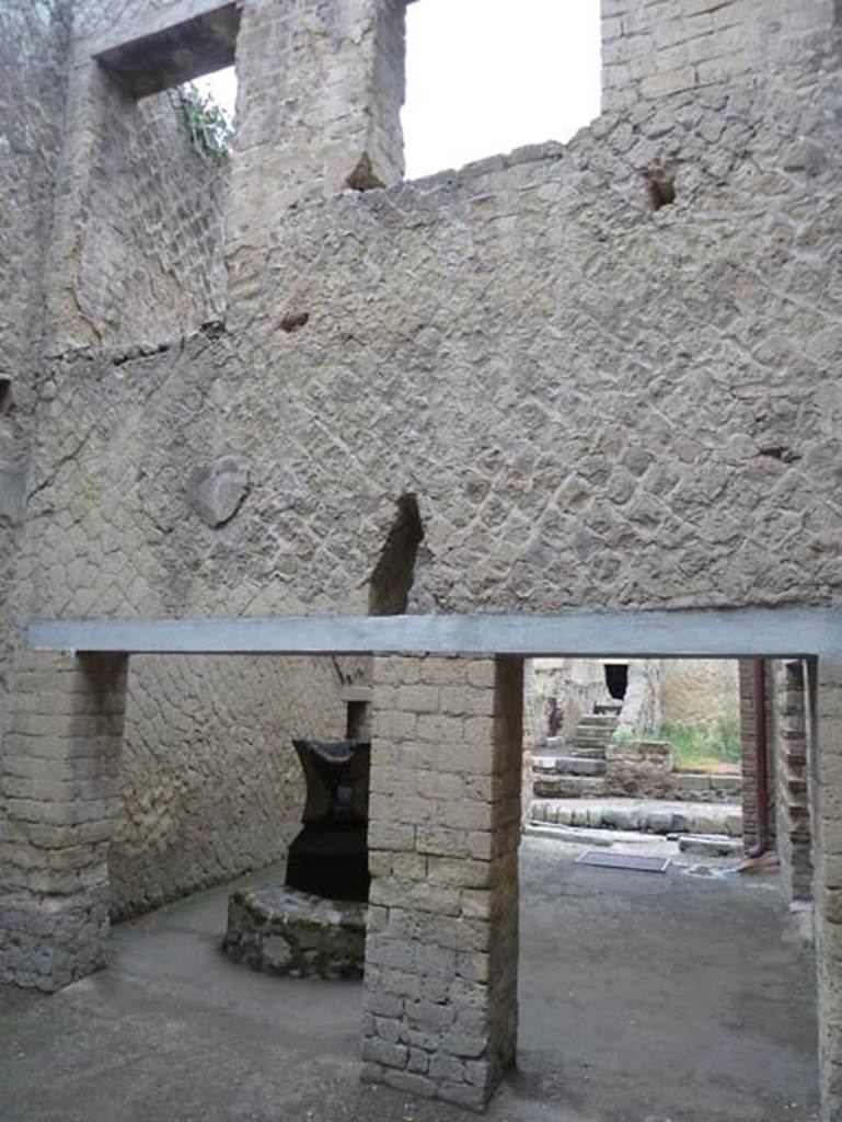 Ins. Orientalis II.8, Herculaneum. September 2015.  Looking west from rear room, probably used as a stable for the animals that turned the mill-stones, towards the mill-room with an upper floor above.
