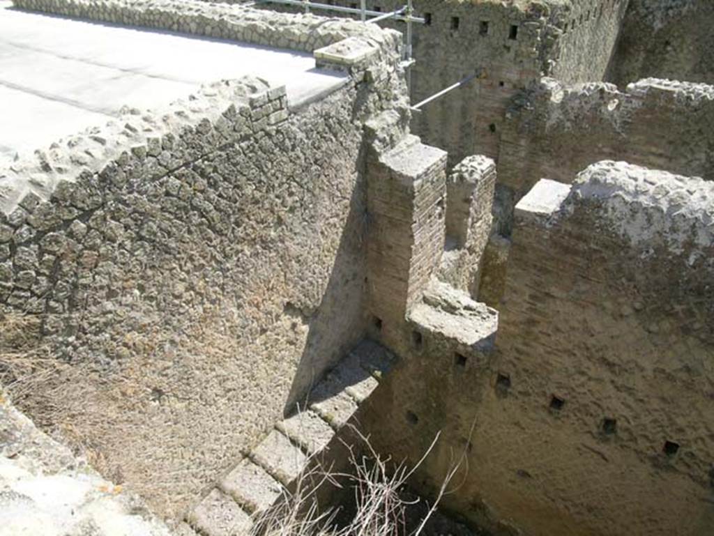 Ins Or II, 8, Herculaneum. May 2006. Upper floor, looking south, from upper floor above bakery, through doorway across Ins.Or.II.7
Photo courtesy of Nicolas Monteix.

