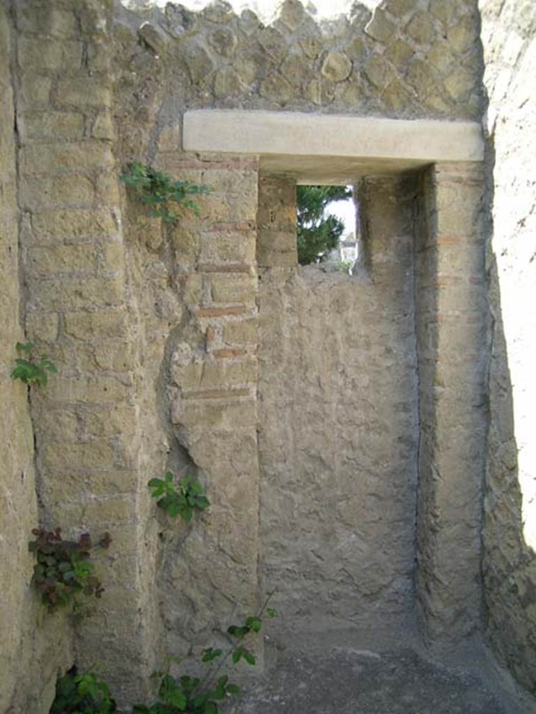 Ins. Or. II.8/9 Herculaneum. May 2006. 
Looking west on upper floor towards a doorway to balcony (now bricked in). Photo courtesy of Nicolas Monteix.
