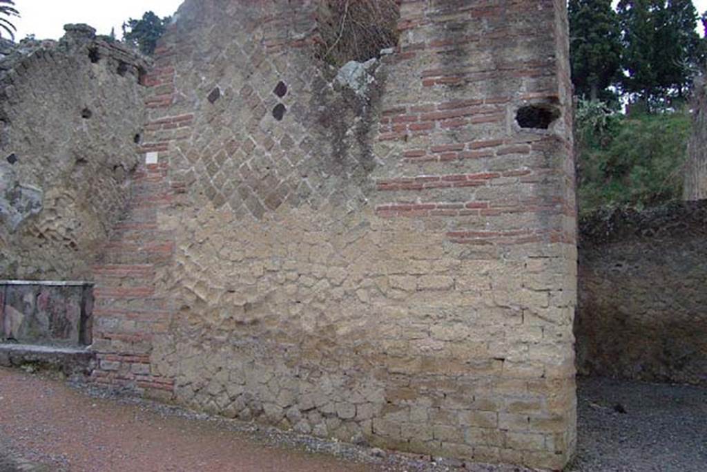 Ins. Or II. 12, Herculaneum. January 2002.  Faade on north side of entrance doorway. 
Photo courtesy of Nicolas Monteix.
