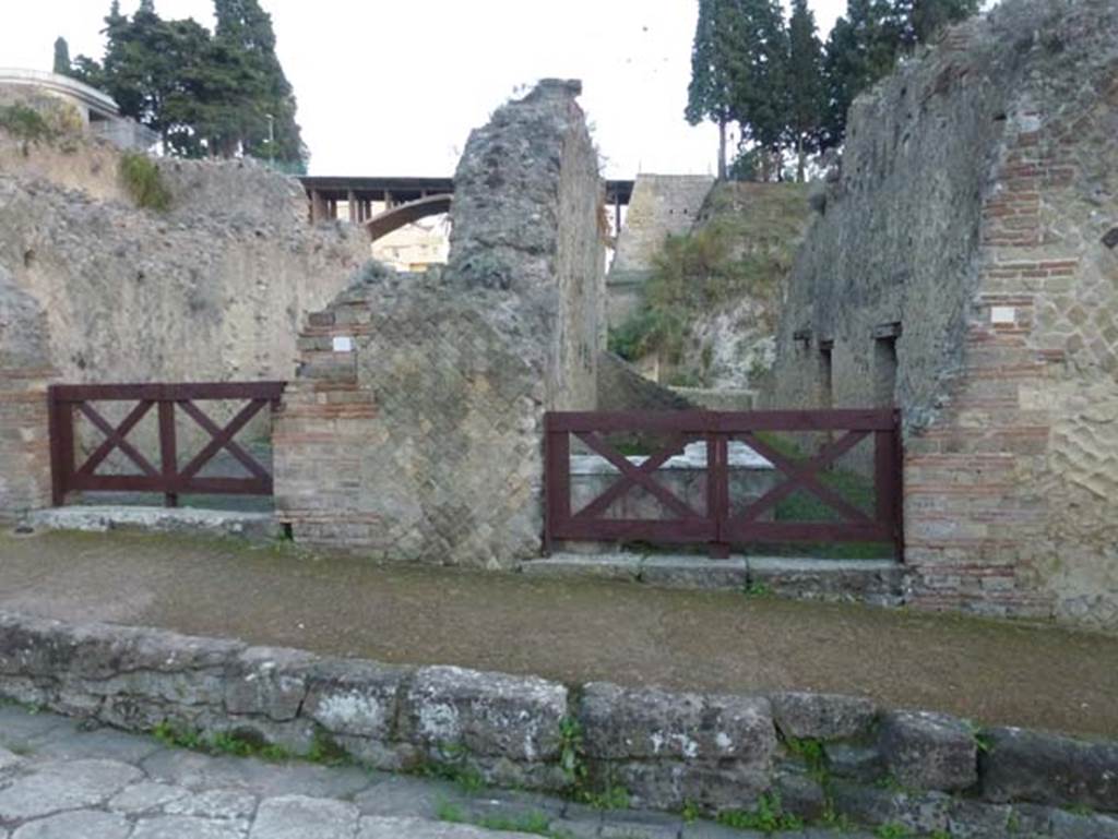 Ins. Or. II.13, Herculaneum, on right. October 2012. Looking east to entrance doorway, with Ins.Or.II.14, on left.  Photo courtesy of Michael Binns.
