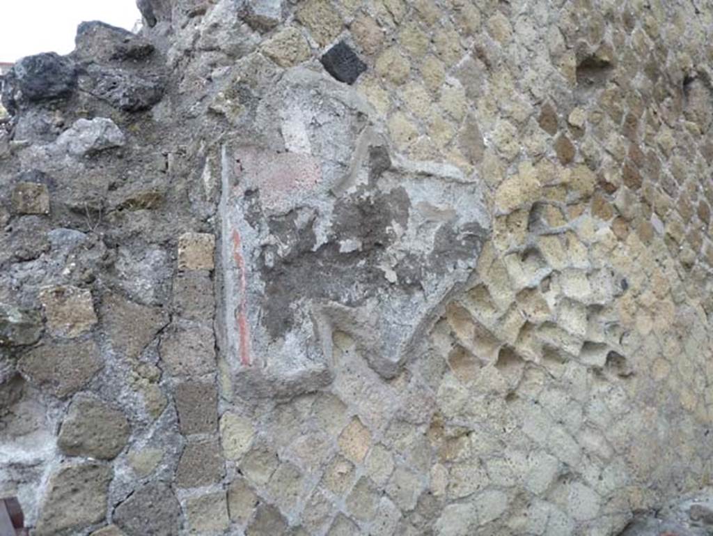 Ins. Orientalis II.13, Herculaneum. September 2015. Detail from north wall of shop-room.