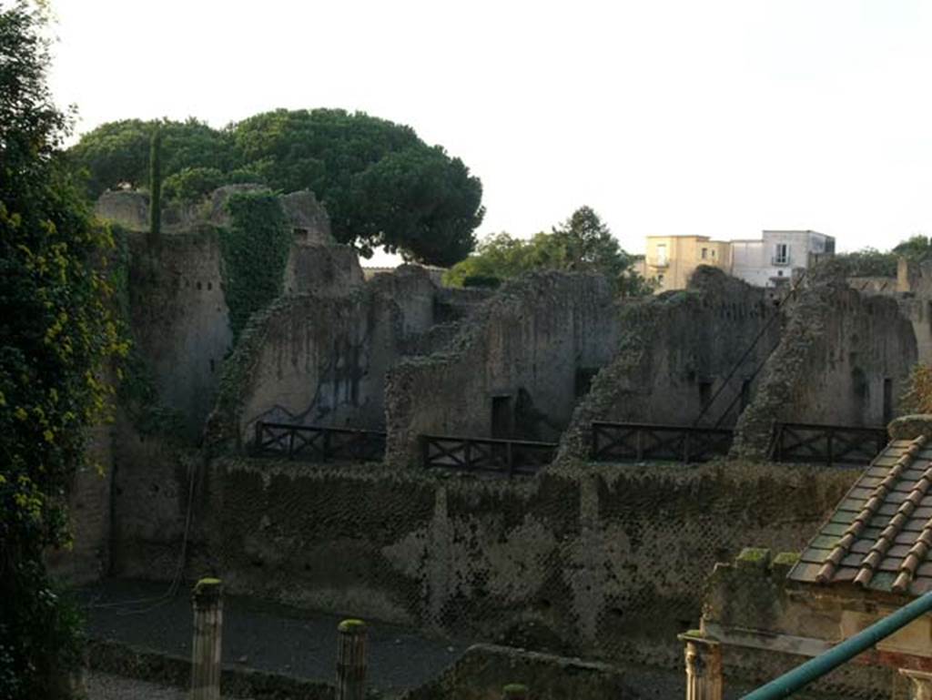 Ins. Orientalis II.14, Herculaneum. December 2004. 
View of Ins. Or.II, 10, 11, 13, and 14 (on right), looking west towards rear, across rectangular area on west side of Palaestra portico.
Photo courtesy of Nicolas Monteix.

