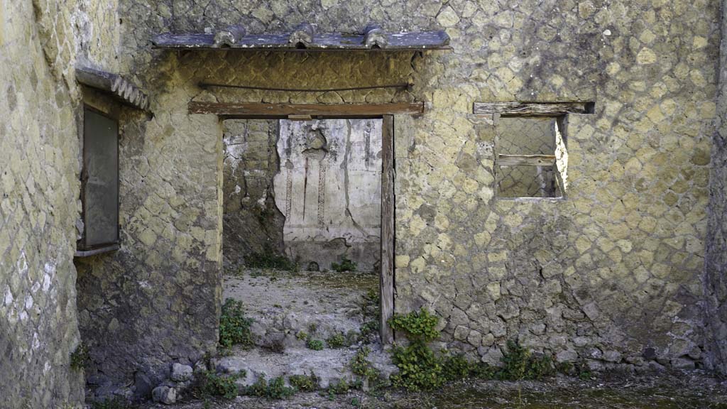 Ins. Orientalis II.16, Herculaneum. August 2021. 
Looking towards east wall with doorway to a rear room. Photo courtesy of Robert Hanson.
