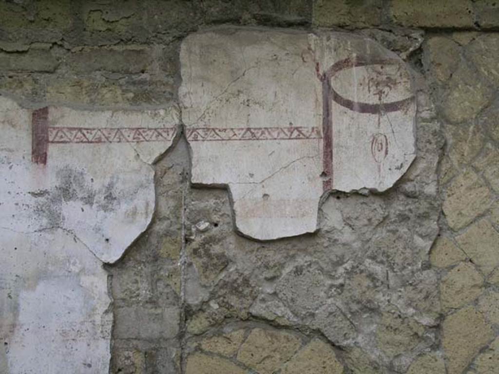 Ins Or II, 16 Herculaneum. May 2004.  Rear room, remains of decoration from east wall.
Photo courtesy of Nicolas Monteix.

