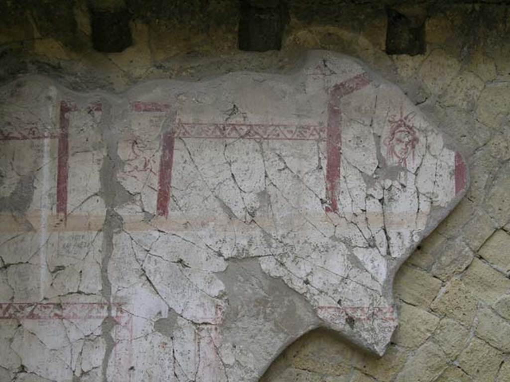 Ins Or II, 16 Herculaneum. May 2004.  North wall of rear room, detail of decoration from north wall.   
Photo courtesy of Nicolas Monteix.
