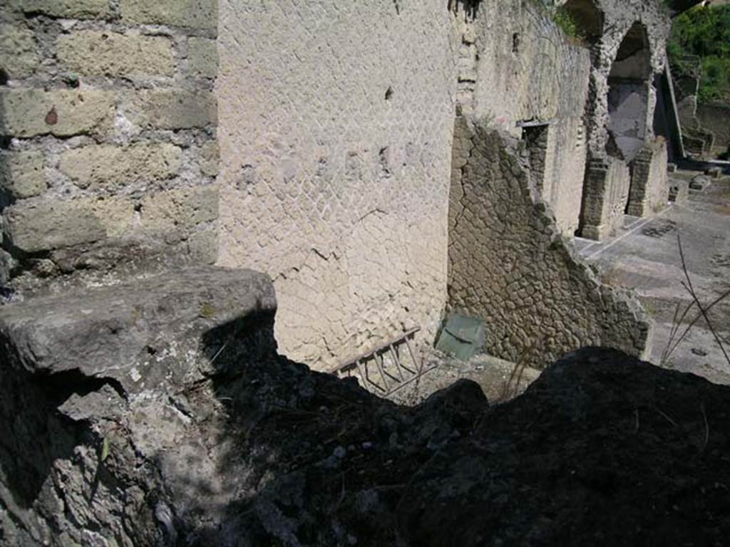 Ins Or II, 16, Herculaneum. May 2004. Rear room, upper east wall with remains of doorway looking towards the upper loggia/terrace of Ins.Or.II, 4/19. 
Photo courtesy of Nicolas Monteix.
