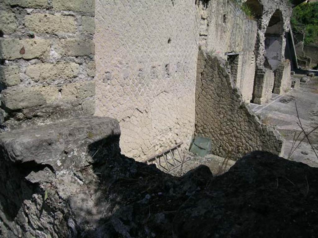 Ins Or II, 16/19 Herculaneum. May 2004. Looking east along loggia of the Palaestra. 
Upper rear room of 16, upper east wall with remains of doorway leading towards an upper floor above loggia of Ins.Or.II, 19.
Centre right of photo is a doorway behind the wall, this doorway is in the south wall of the large room of the Upper Aula.
Photo courtesy of Nicolas Monteix.

Photo courtesy of Nicolas Monteix.
