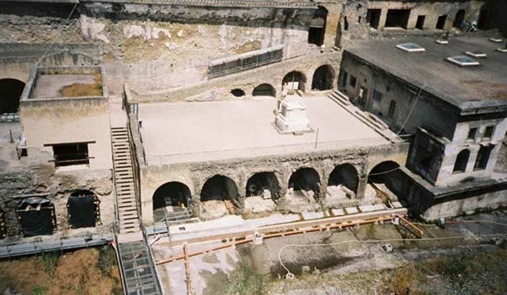 Herculaneum, May 2007. Looking north towards the Terrace of Balbus, centre, with east end of arched openings described as boat-sheds below it. Photo courtesy of Buzz Ferebee.
