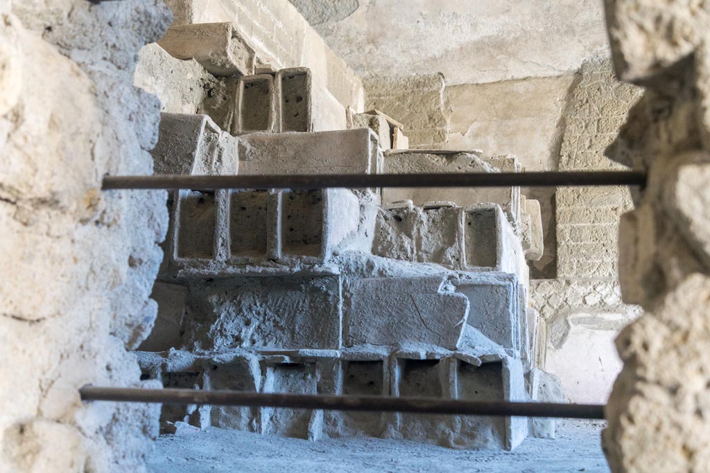 Herculaneum Suburban Baths. October 2023.
Terracotta tubes stacked in the Baths, and still awaiting installation as heating flues, completely filled with the dense ash from the pyroclastic flows. 
Photo courtesy of Johannes Eber. 
