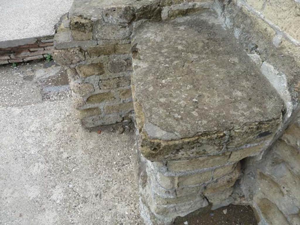 Herculaneum, September 2015. Sacred Area terrace, masonry podium/altar on the west side of the doorway of the shrine of Venus. 