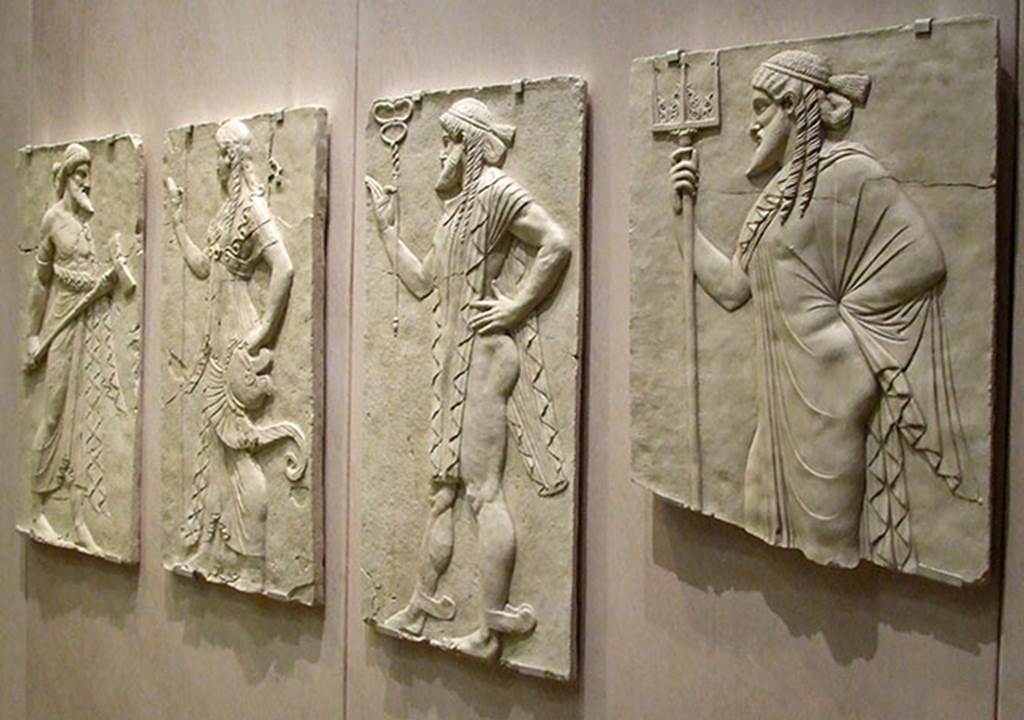 Herculaneum, September 2009. Sacred Area terrace, the shrine of Four Gods. Copy of reliefs of the four gods.
From the left are Vulcan, Minerva, Mercury and Neptune.
Photographed at “A Day in Pompeii” exhibition at Melbourne Museum.
