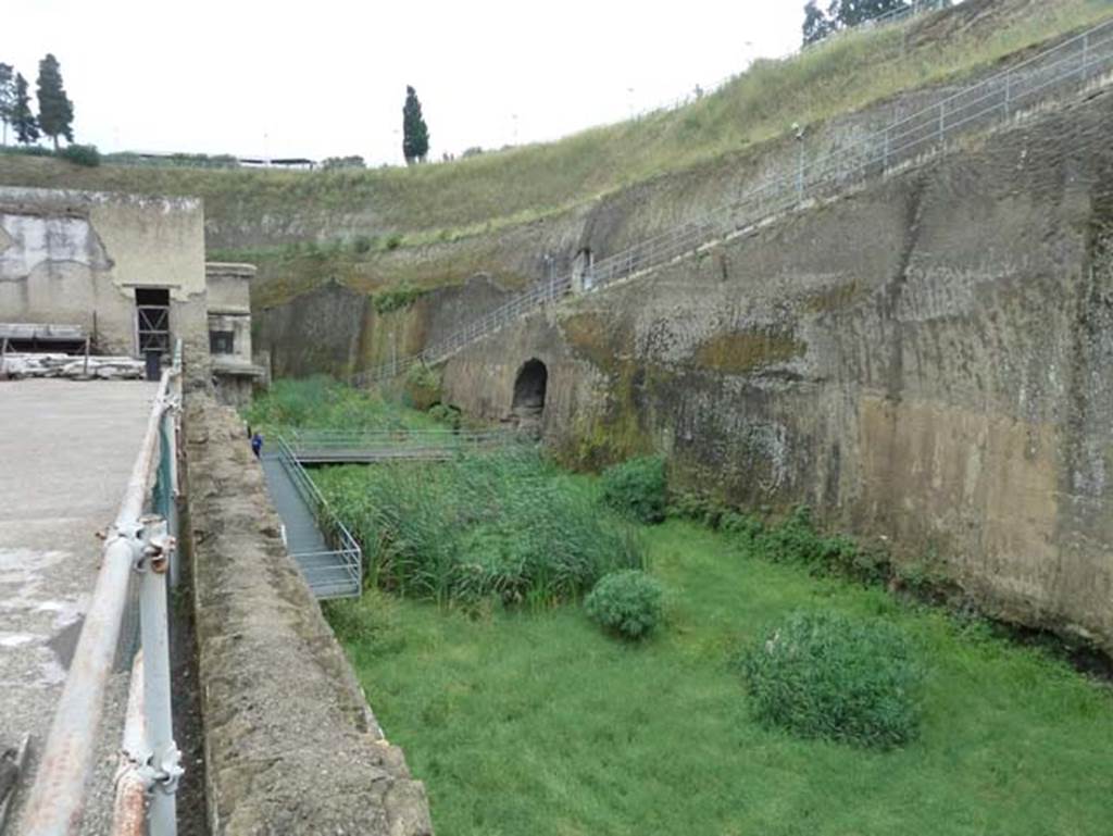 Herculaneum, September 2015. Sacred Area terrace, looking east down on the beachfront.