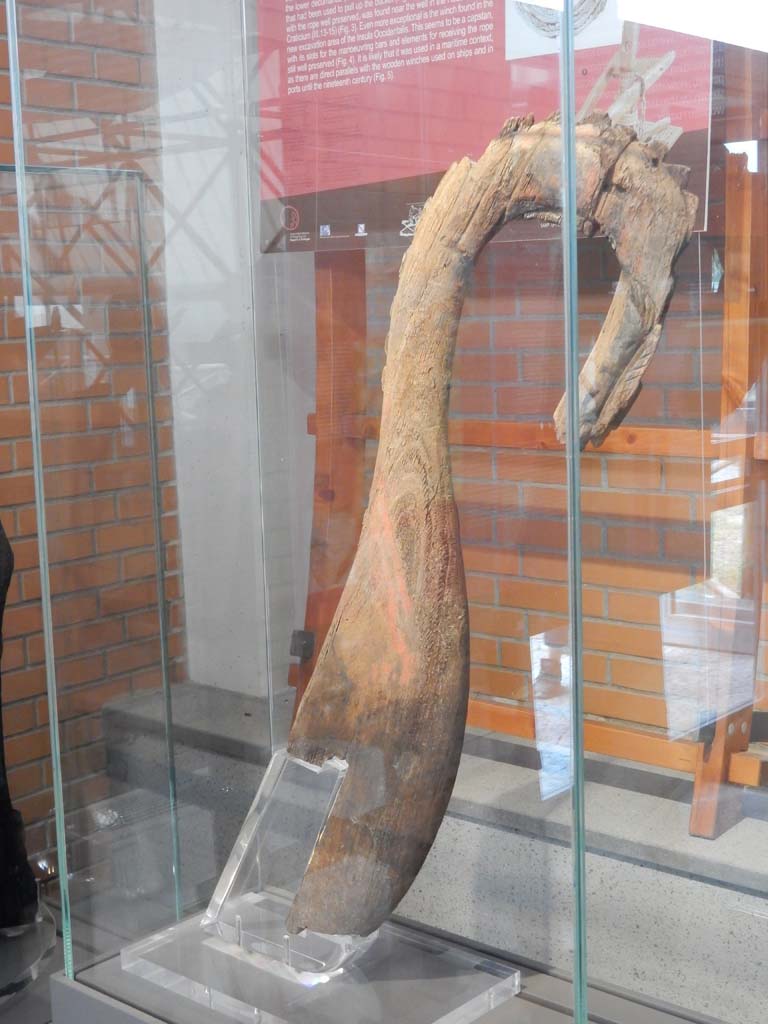 Herculaneum, June 2019. Red prow in the shape of a serpent. Photo courtesy of Buzz Ferebee.