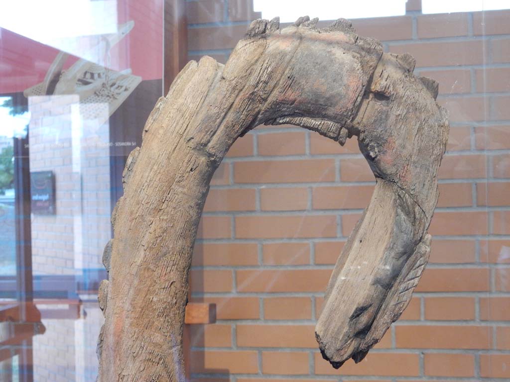 Herculaneum, June 2019. Detail from red prow in the shape of a serpent. Photo courtesy of Buzz Ferebee.