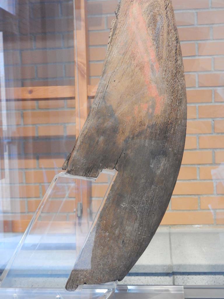 Herculaneum, June 2019. Detail from red prow in the shape of a serpent. Photo courtesy of Buzz Ferebee.