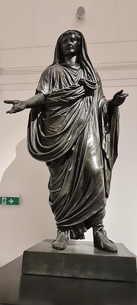 Herculaneum Theatre. April 2023. 
Bronze statue of Tiberius, inv. 5615. Photo courtesy of Giuseppe Ciaramella.
