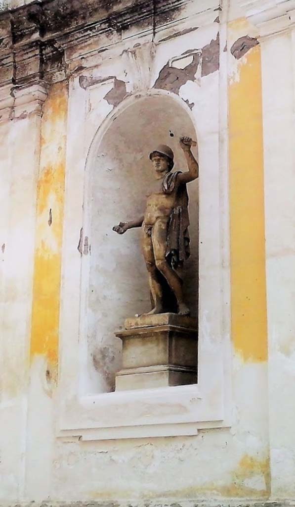 Herculaneum Theatre. Statue possibly from the Theatre in niche outside at the Royal Palace of Portici.
Photo courtesy of Davide Peluso.

