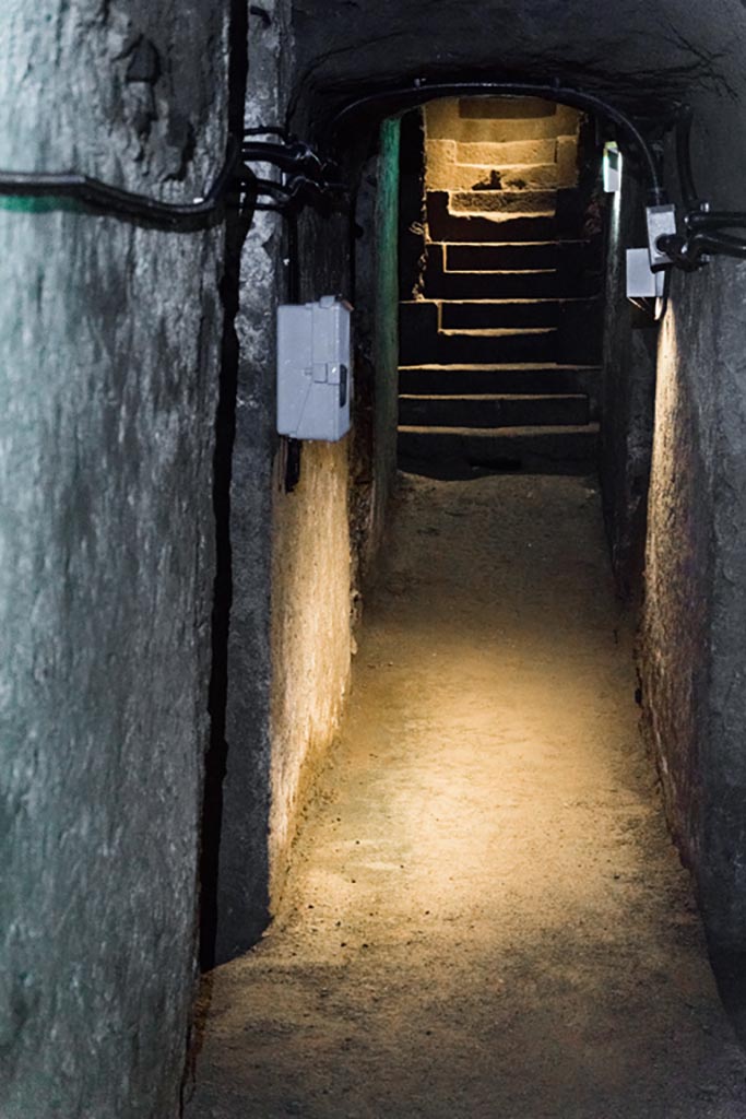 Herculaneum Theatre. October 2023. 
Original steps up between the rows of seats in the theatre. Photo courtesy of Johannes Eber. 
