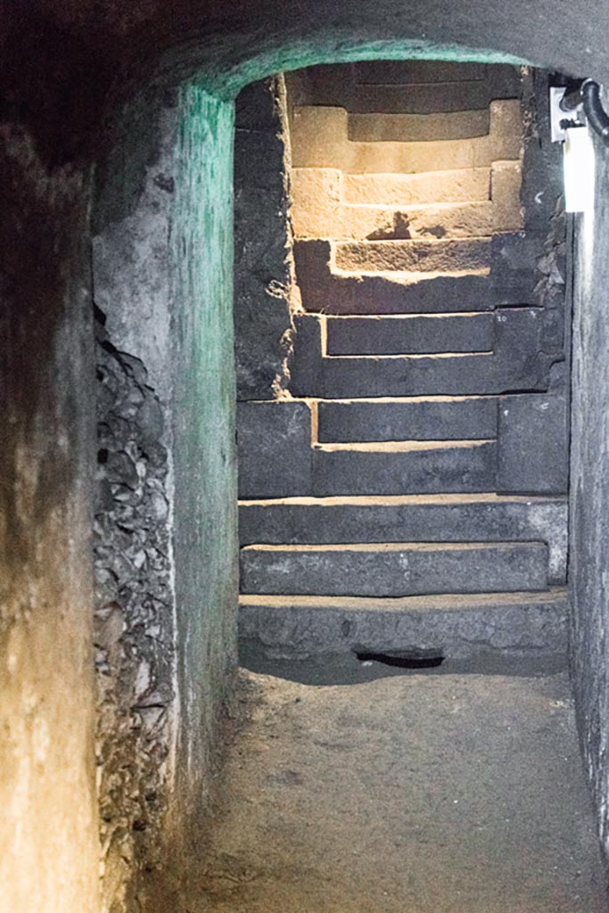 Herculaneum Theatre. October 2023.
Detail of original steps up from the theatre. Photo courtesy of Johannes Eber. 
