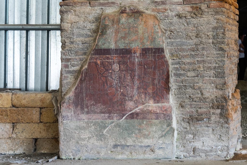 Herculaneum Villa dei Papiri. October 2023. 
Room (a), north wall between corridor (u) on left, and room (s), on right, with detail of painting. Photo courtesy of Johannes Eber. 
