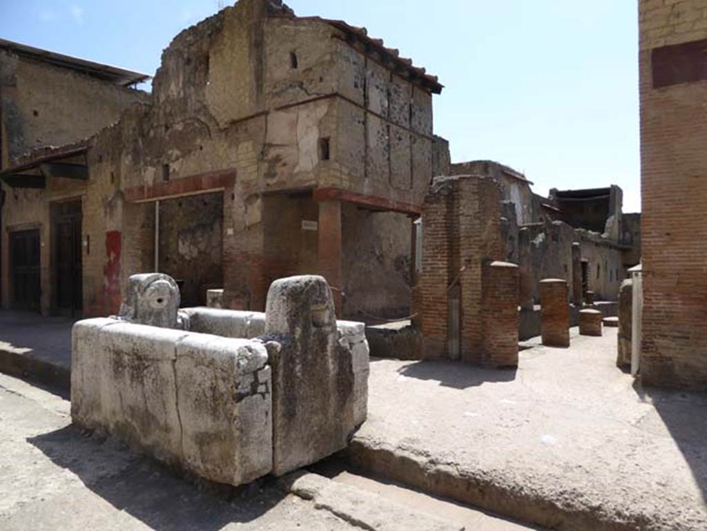 Fountain of Venus with water tower behind, in centre. July 2015. Looking south-east from Decumanus Maximus. Photo courtesy of Michael Binns.

