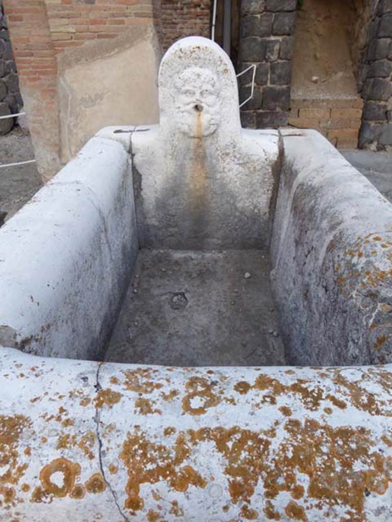 Decumanus Maximus, Herculaneum, October 2014.  Fountain decorated with head of Hercules, from fountain on east end of the Decumanus Maximus. Photo courtesy of Michael Binns.
