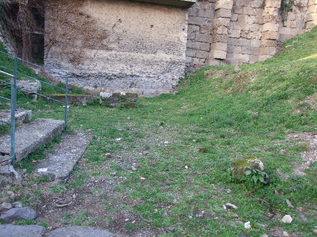 Street altar in the centre of the wall at the north end of the Via di Mercurio. From model in Naples Archaeological Museum.