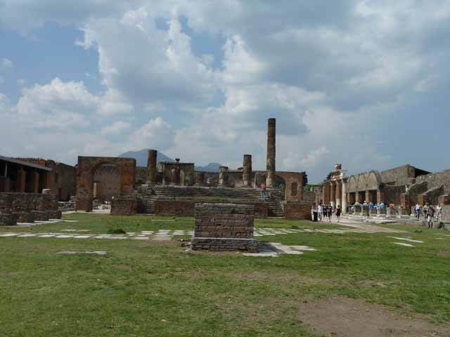 Arch of Augustus. December 2005. Looking north along west side of Temple of Jupiter.