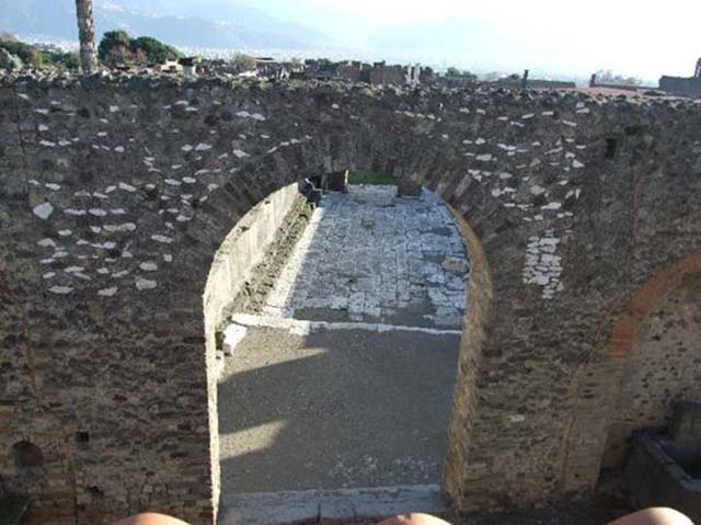 Arched Entrance in North West Corner of Forum. December 2007. Looking down from roof of restaurant at VII.5.19.