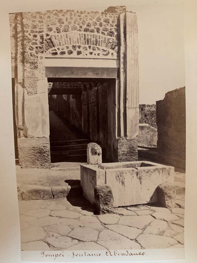 VII.9.67 Pompeii. Photograph by M. Amodio, from an album dated April 1878.
Looking north on Via dellAbbondanza towards fountain. Photo courtesy of Rick Bauer.
