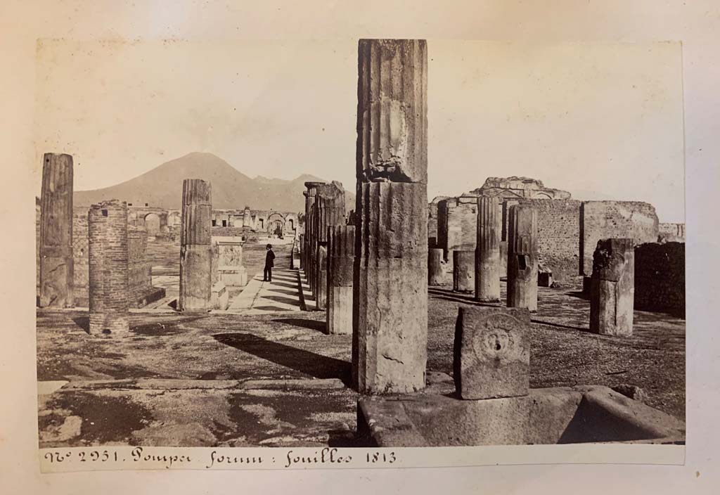 Fountain outside VIII.2.11, Pompeii. 
From an album of Michele Amodio dated 1874, entitled Pompei, destroyed on 23 November 79, discovered in 1745. 
Looking north towards Forum from fountain at end of Via delle Scuole. Photo courtesy of Rick Bauer.

