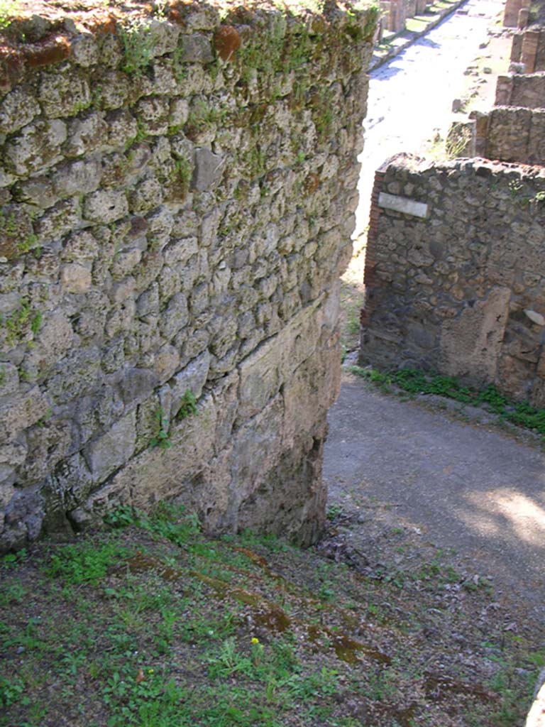 Porta Stabia, Pompeii. May 2010. 
Upper exterior east side and north-east corner, looking north-west down area of steps. Photo courtesy of Ivo van der Graaff.
