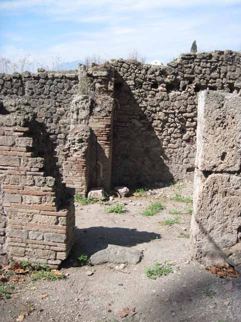 I.1.10 Pompeii. September 2010. Looking west towards room with doorway leading to I.1.1, from entrance room. Photo courtesy of Drew Baker.