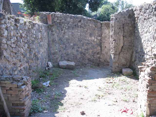 I.1.10 Pompeii. September 2010. Looking west from room in north-east corner, across entrance room. Photo courtesy of Drew Baker.