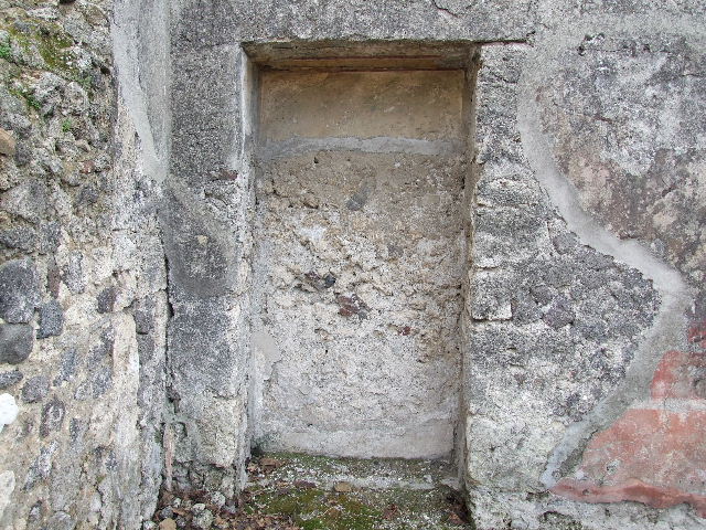I.2.10 Pompeii. September 2010. Door-sized recess or cupboard in south wall of atrium, in south-east corner. Photo courtesy of Drew Baker.
