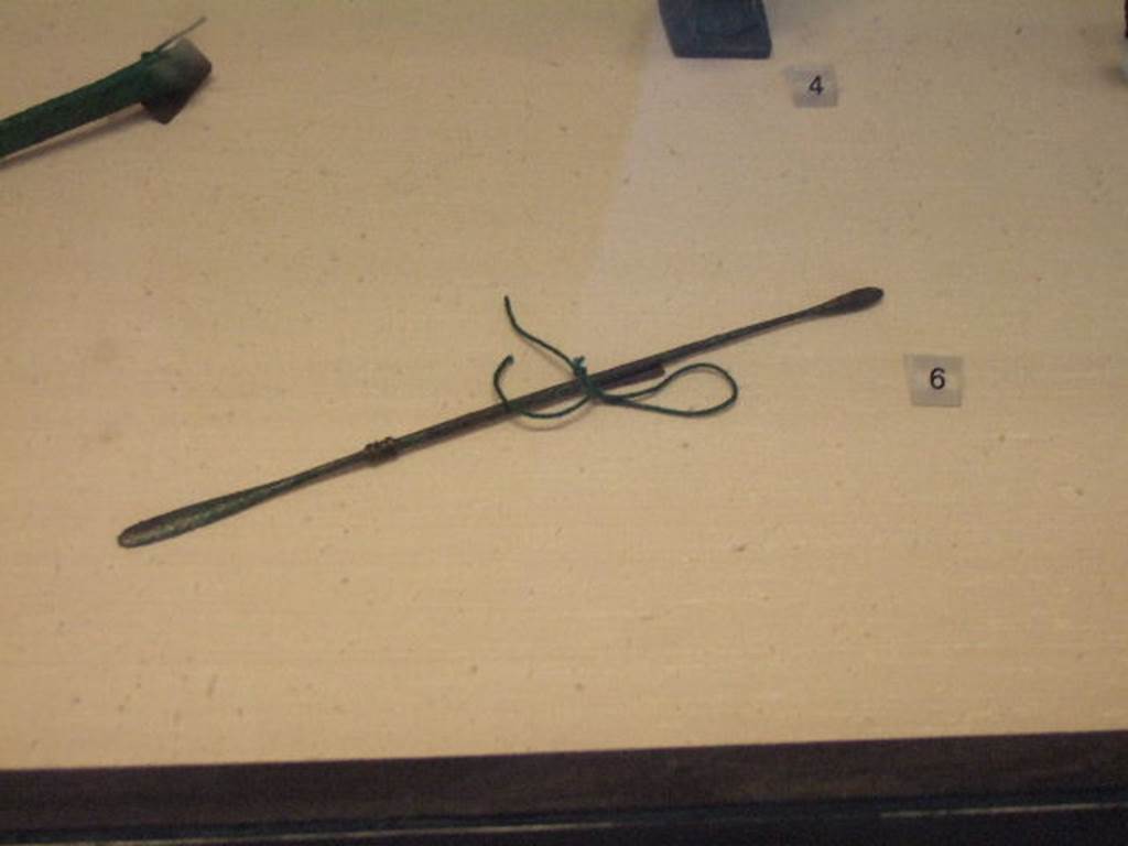I.2.10 Pompeii.   Found in cubiculum.  Spatula. Now in Naples Archaeological Museum. Inventory number: 119203.