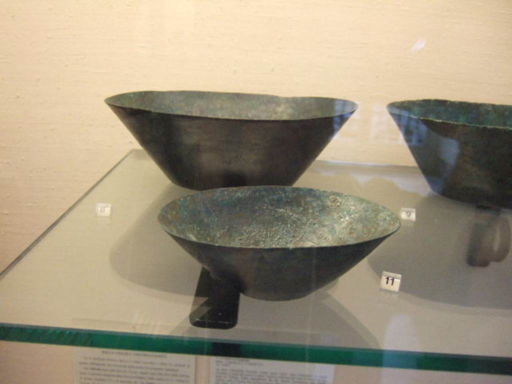 I.2.10 Pompeii.  Found in atrium. Bronze bowls.  Now in Naples 
Archaeological Museum. Inventory numbers: 110068 and 110069.