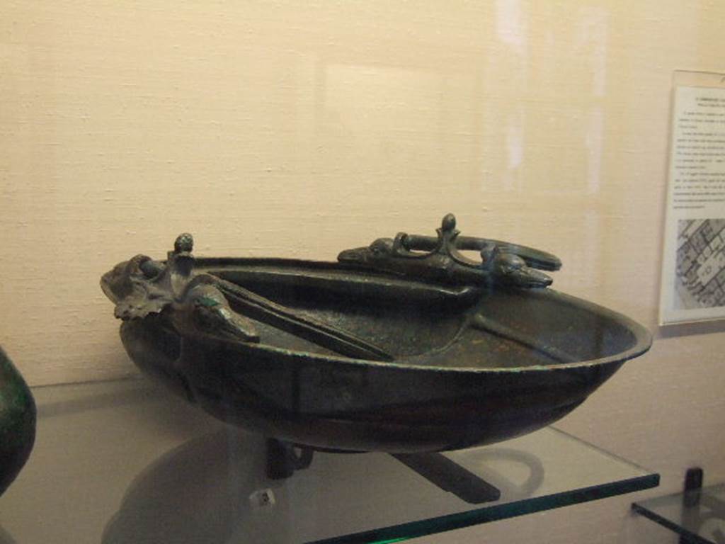 I.2.10 Pompeii.  Found in atrium. Bronze bowl or basket.  Now in Naples Archaeological Museum. Inventory number: 109698.