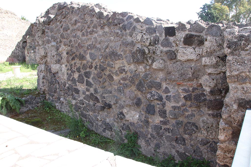 I.2.11 Pompeii. October 2024. Looking east along south wall of bar-room. Photo courtesy of Klaus Heese.