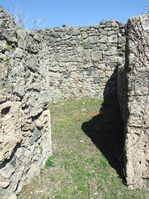 I.2.16 Pompeii.  March 2009.  Looking south west from Room 3, Doorway to East Portico, and small doorway to Room 4.