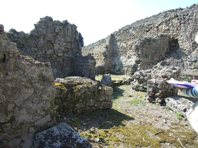 I.2.21 Pompeii. September 2010.  Looking north from bar, across entrance corridor of I.2.20 to small room on north side. Photo courtesy of Drew Baker.
