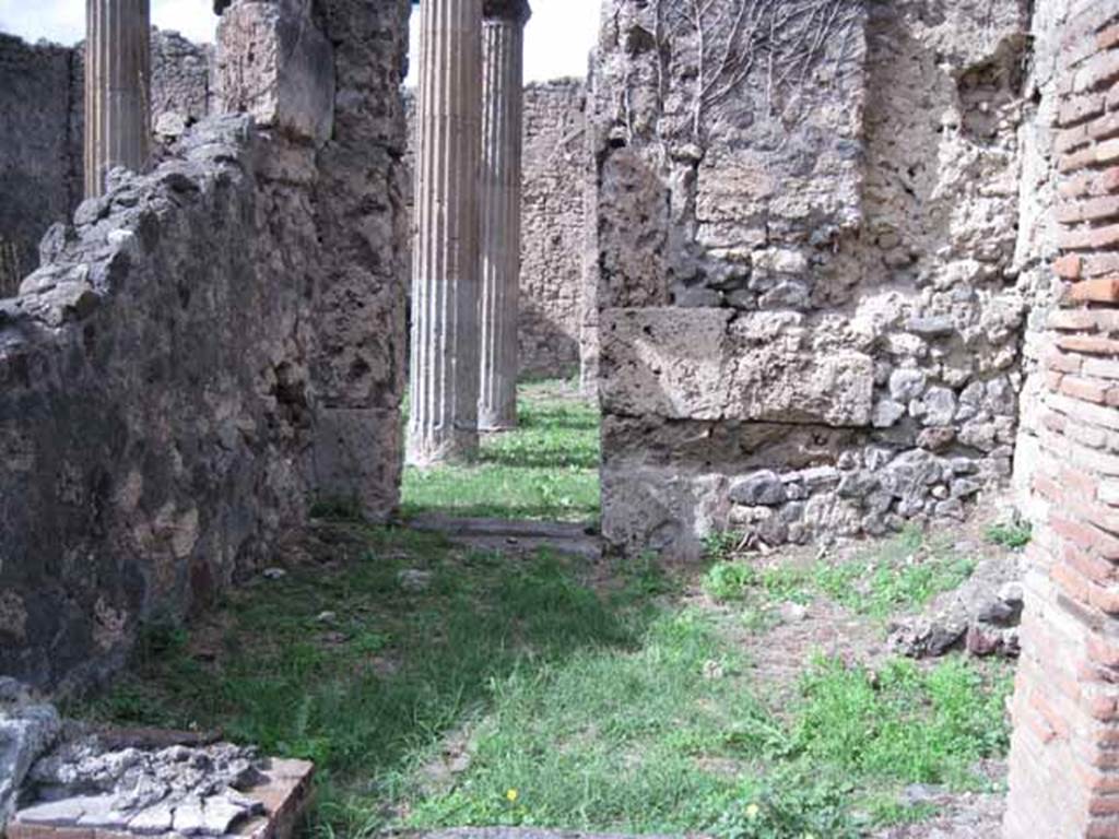 I.2.27 Pompeii. September 2010. Looking north from entrance doorway towards rear wall with doorway to atrium of I.2.28. Photo courtesy of Drew Baker.
