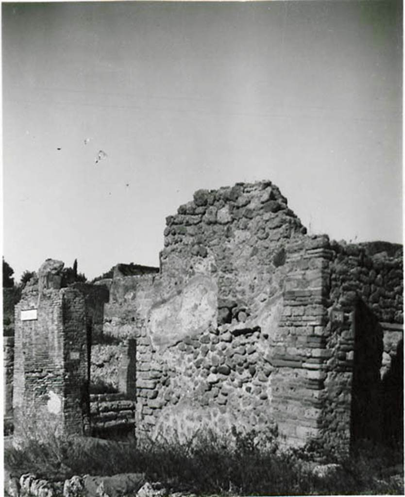 I.2.31 Pompeii. September 2005.  Looking north into rear room of caupona at 1.2.1, with the remains of entrance cill or doorway.  Painted near to the entrance on the brick construction, according to Fiorelli, was -     
CELSVMAED
      O.V.F
See Pappalardo, U., 2001. La Descrizione di Pompei per Giuseppe Fiorelli (1875). Napoli: Massa Editore. (p.34)

